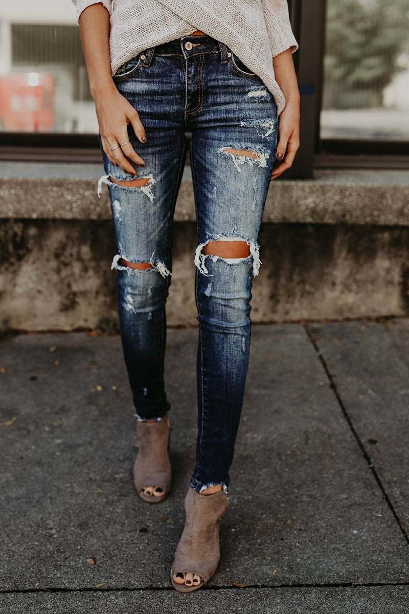 Jeans pitillo efecto roto y desgastado